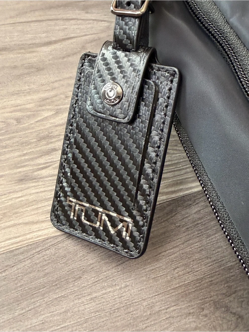 TUMI Monroe Foxwood Black BackpackCarbon Fiber Accents